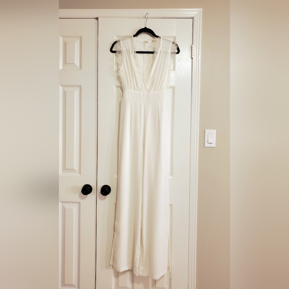 WHITE JUMPSUIT WITH LACE DETAIL - Picture 1 of 3